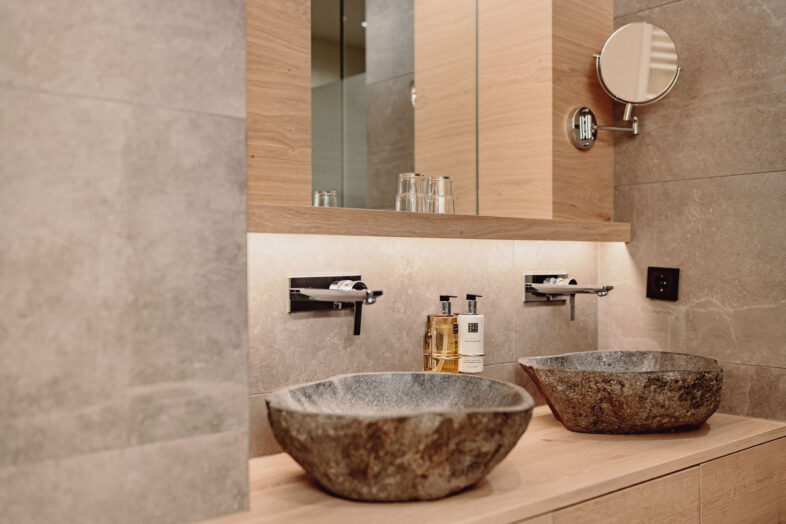 Badezimmer im Alpina Alpendorf